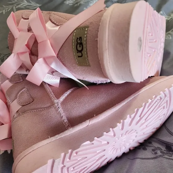 2 Pair of Pink UGG Boots