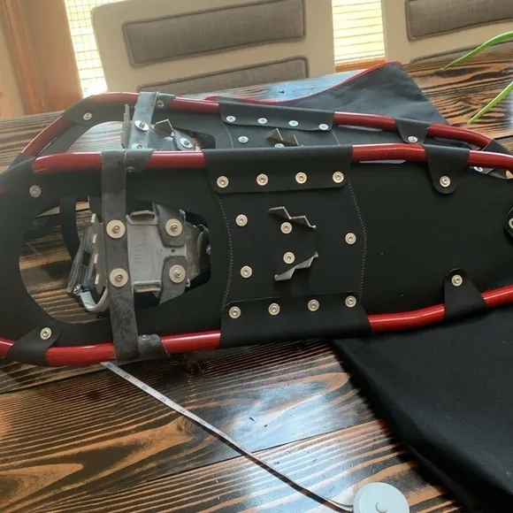 A pair of Atlas Snow shoes about 28 in long