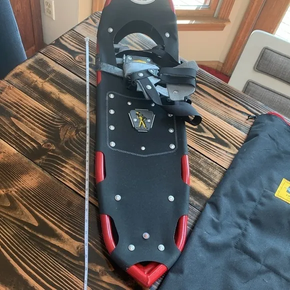 A pair of Atlas Snow shoes about 28 in long