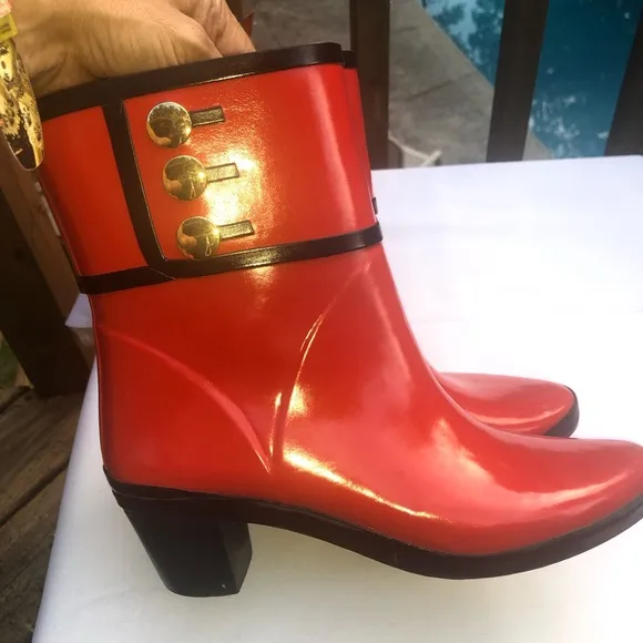 Cutesy Red Kate Spade booties fashion and function all in one great pair ofshoes