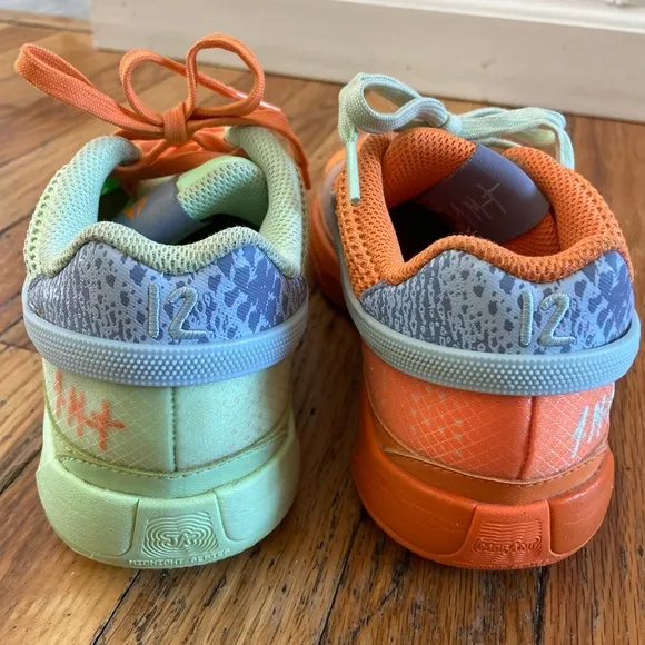 Nike ja 1 youth mismatched basketball Orange and Mint Sneakers sz 5.5