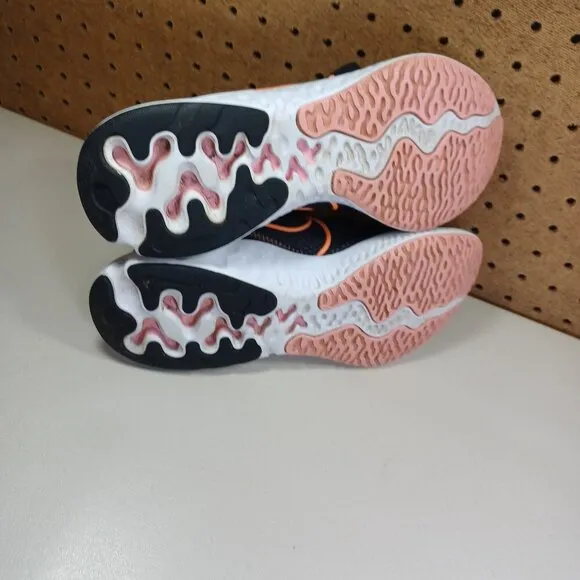 Nike womens black orange pink Renew running shoes 7.5 M ck6360