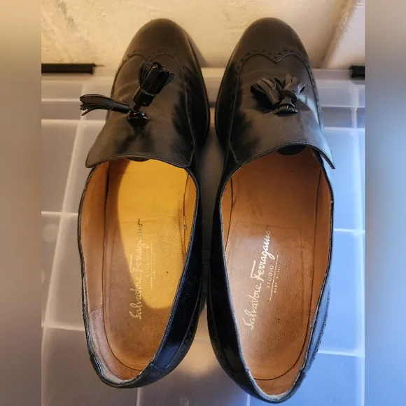 Salvator Ferrigamo men's black leather shoes.