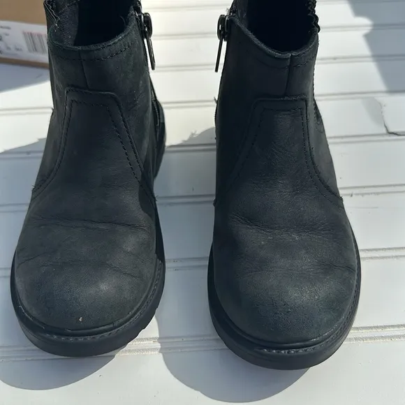 Ugg boots size 12 style T Bolden weather in black. like new in original box