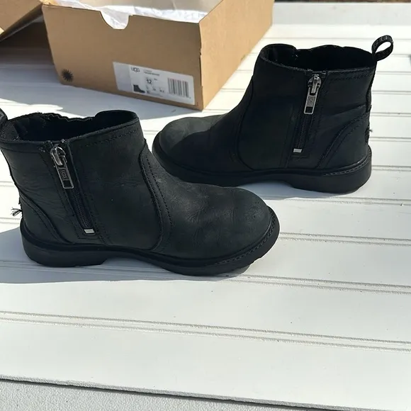 Ugg boots size 12 style T Bolden weather in black. like new in original box