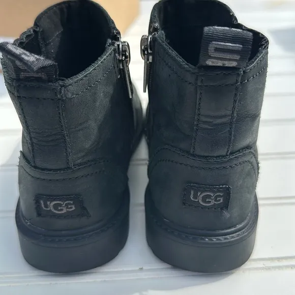 Ugg boots size 12 style T Bolden weather in black. like new in original box