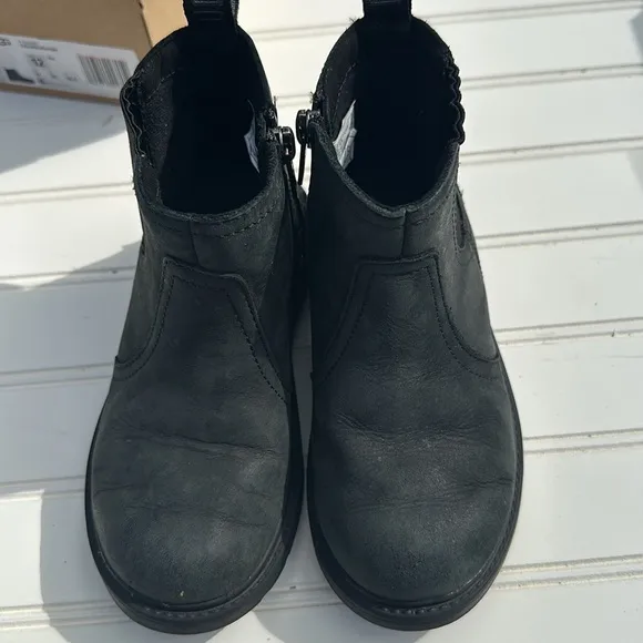 Ugg boots size 12 style T Bolden weather in black. like new in original box